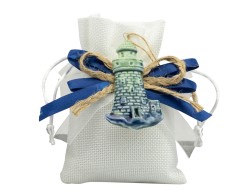 Sacchetto harmony 2024 magnete ancora e faro blu in porcellana 2 assortiti su Bomboniere Dolci Emozioni