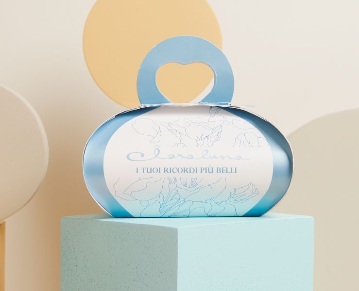 Bomboniera Claraluna Scatolina scatolina azzurra con cuore azzurro e candela su Bomboniere Dolci Emozioni