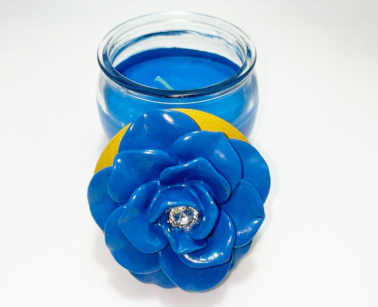 Bomboniera Matrimonio Mariella Martini candela profumata blu con coperchio con applicazione rosa su Bomboniere Dolci Emozioni