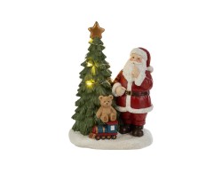 Statuetta di Babbo Natale in resina che fa silenzio accanto a un albero di Natale con luci LED alta 18 cm