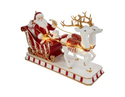 Babbo Natale sulla slitta con renne in resina con luci LED e musiche natalizie – Decorazione Natalizia Le Stelle su Bomboniere Dolci Emozioni