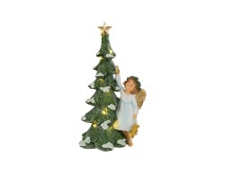 Statua natalizia in resina alta 31 cm con angelo dalle ali dorate accanto a un albero di Natale innevato e illuminato