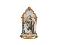 Scultura natalizia in resina con Sacra Famiglia sotto arcata dorata e fondo stellato altezza 30 cm.