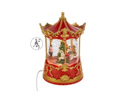 Giostra natalizia da tavolo con cavallini, luci LED, musica e neve in movimento altezza 21 cm.