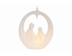 Sacra Famiglia stilizzata in porcellana bianca con stella cometa e illuminazione LED calda interna altezza 19 cm.