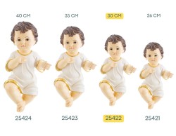 Statuina del Bambino Gesù in resina con tunica bianca e bordo dorato altezza 30 cm per presepe.